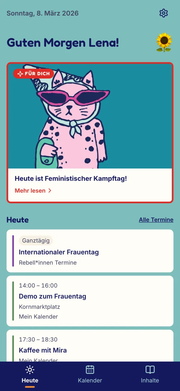 Der Heute-Bildschirm der App: ein Gruß, der Wissensimpuls „Heute ist Feministischer Kampftag!“ mit einer gezeichneten Katze und die Termine des Tages.